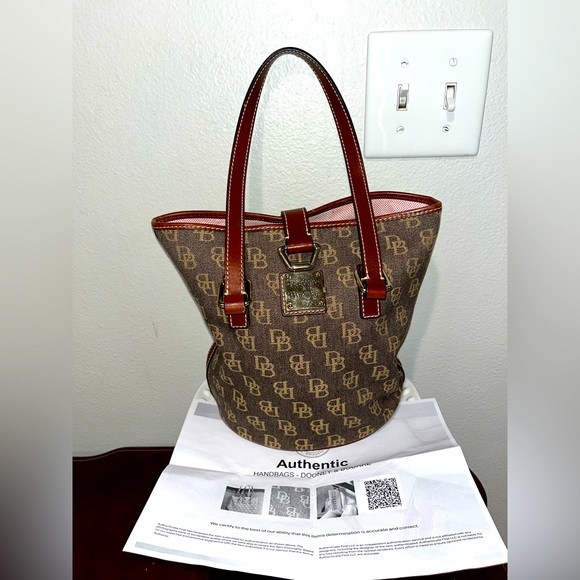 Dooney & Bourke Handbags - Dooney & Bourke Brown Canvas Bucket Bag W/ COA!